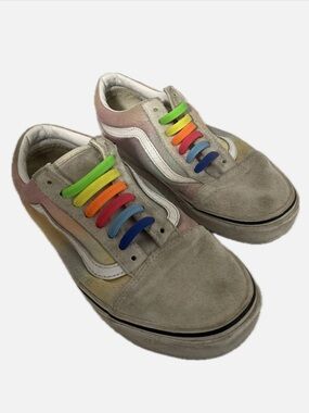 Vans tie dye sneakers with rainbow laces.